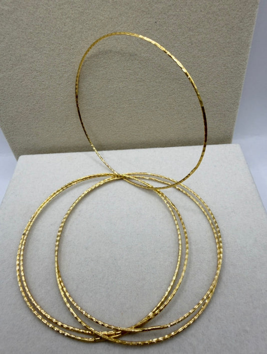 Set of five connected bangles